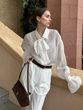 Laden Sie das Bild in den Galerie-Viewer, White Tie Bow Sexy Transparent Trumpet Sleeve Blouse
