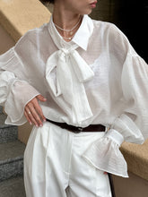 Laden Sie das Bild in den Galerie-Viewer, White Tie Bow Sexy Transparent Trumpet Sleeve Blouse
