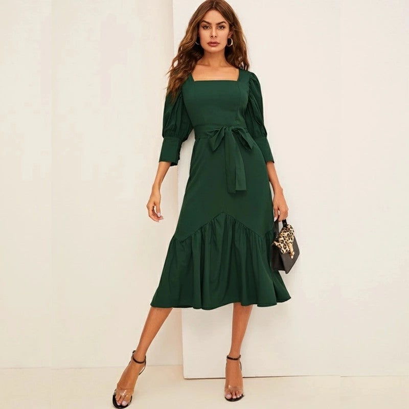 three quarter sleeve flounce hem belted dress